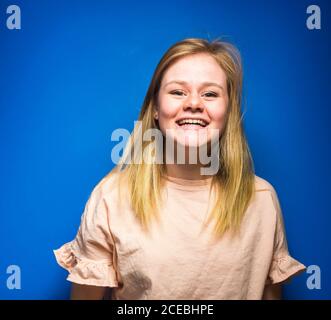 Blonde Woman posing in studio Stock Photo