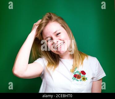Blonde Woman posing in studio Stock Photo