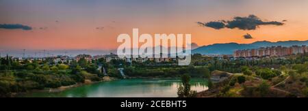 Breathtaking drone view of wonderful sundown sky over wonderful Malaga, Spain Stock Photo