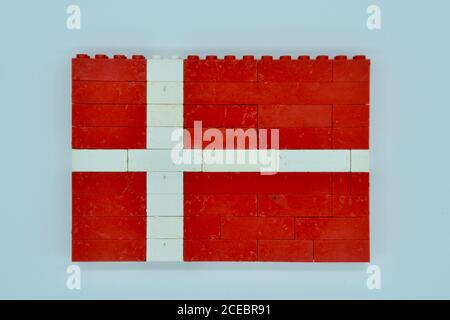 Concept of a national flag of Denmark made from old fashioned vintage plastic lego building bricks Stock Photo