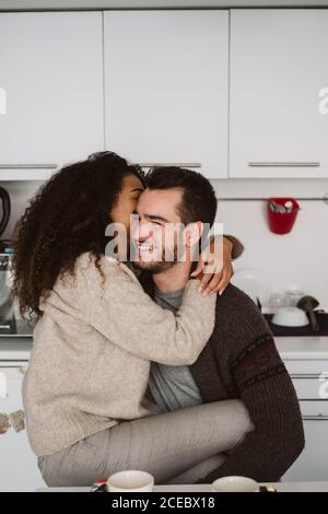 Multiethnic couple in modern kitchen Stock Photo