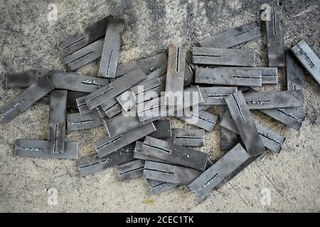 metallic pieces in the fabrication workshop. Stock Photo