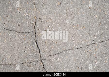 natural texture background gray cracked asphalt outdoor Stock Photo