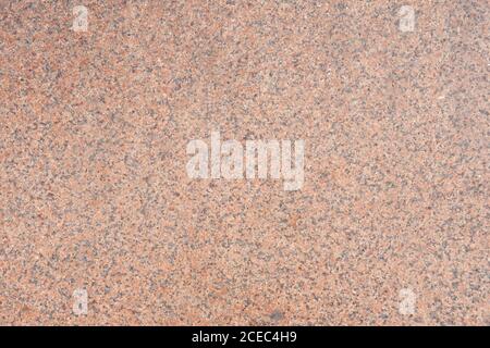natural texture background sleek red granite sunny weather outdoor Stock Photo