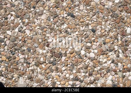 natural texture background concrete with stones sunny weather outdoor Stock Photo