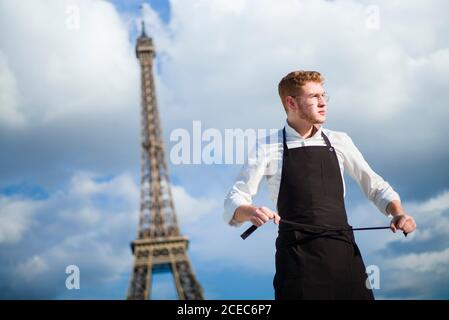 Red-Hair cook with uniform in Paris Stock Photo