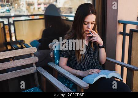 Woman reading book Stock Photo