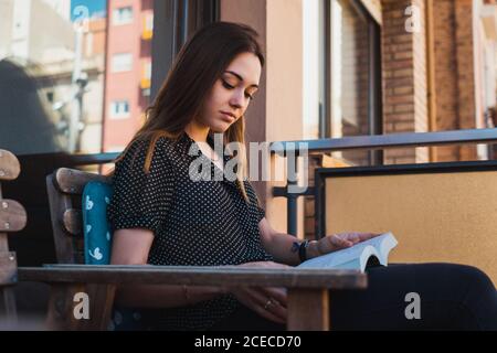 Woman reading book Stock Photo