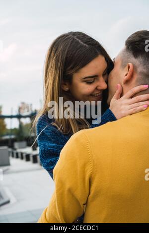 Loving tender couple posing on street Stock Photo