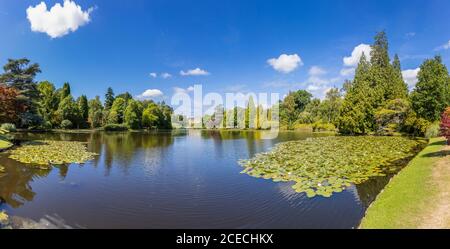 View over Ten Foot Pond in Sheffield Park Garden, an informal landscape garden by Capability Brown in East Sussex, near Haywards Heath, England Stock Photo