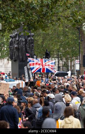 Crowd of protesters at an Anti-Lockdown demonstration, Whitehall, London, 29 August 2020 Stock Photo