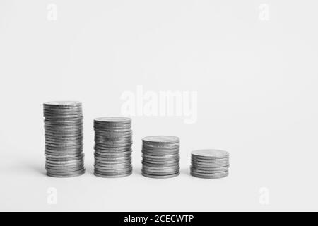 Money saving, financial growth concept. Stacked of coins on white background. Stock Photo