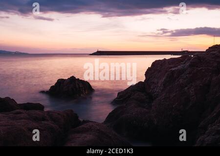 Sunset in cloudy sky Stock Photo