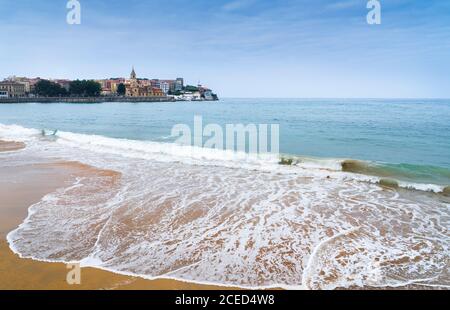 Landscape of Gijon beach in Asturias with the Church area in the background. Stock Photo