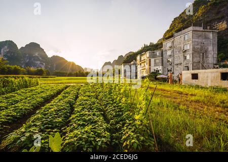 Small town at mountains in Guangxi Stock Photo