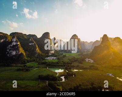 Guangxi fields and town surrounded by mountains