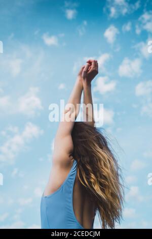 Cheerful Woman in blue swimsuit Stock Photo