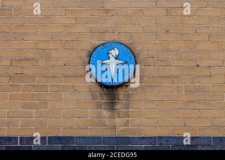 Festival of Britain award on a wall in the pioneering mid-twentieth century architecture of Churchill Gardens Estate, Pimlico, London SW1 Stock Photo