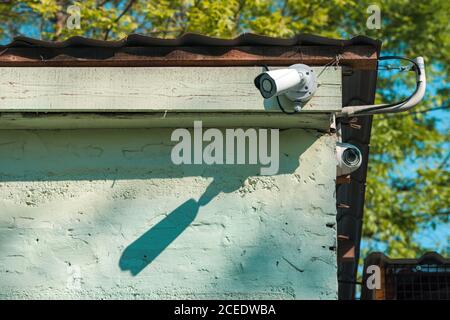 IP camera surveillance of livestock farm mounted on the top of the shed Stock Photo