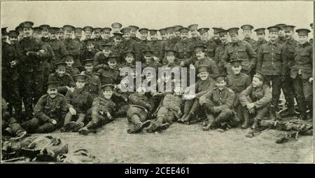 . Kitchener's army and the territorial forces, the full story of a great achievement ;. MOTOR-buses ready TO TAKE THE RECRUITS EQUIPMENT TO CAMP. Kitcheners Army 97. A GKOl 1 Ul- NMIMM. KK(.KI - CHAPTER IVTHE ARTILLERYMAN IN THE MAKING—HORSEMANSHIP AND QUNNERY- WITH THE ENGINEERS. Simultaneously with the progress of thetraining of the new Kitchener infantry regi-ments for the great struggle wliich layahead, other recruits, drafted into differentarms of the service, were as quickly and assteadily drilling and being made ready toassist the infantry when the time came.A story is told by General Stock Photo