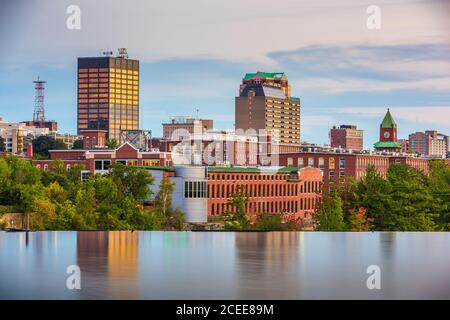 Manchester, New Hampshire, USA Skyline on the Merrimack River at dusk. Stock Photo