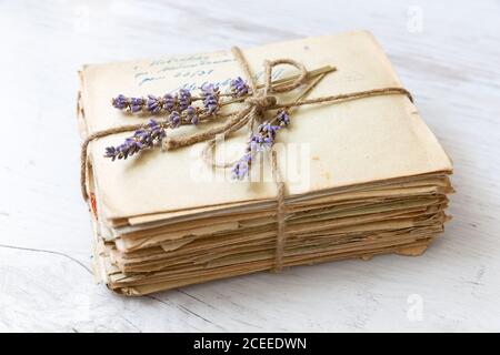 Vintage background with old letters, paper and photos. Retro letters and envelopes. Stock Photo