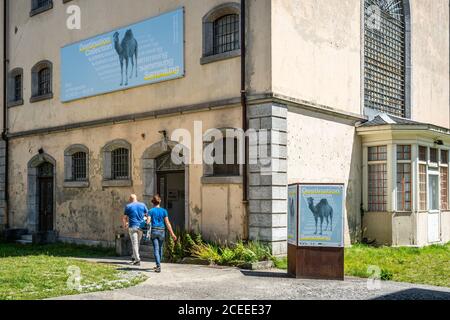 Sion Switzerland , 3 July 2020 : Entrance and two people going to enter Le Penitencier museum a former penitentiary turned into an exposition centre i Stock Photo