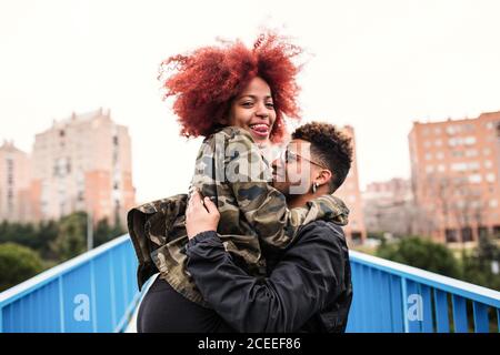 young afro couple having fun on bridge Stock Photo