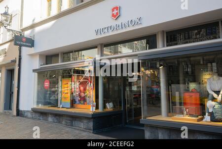 Lucerne Switzerland , 30 June 2020 : Front view of a Victorinox shop with name and logo famous for their Swiss Army knives in Switzerland Stock Photo