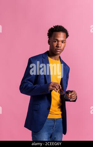Dandy black man in jacket Stock Photo