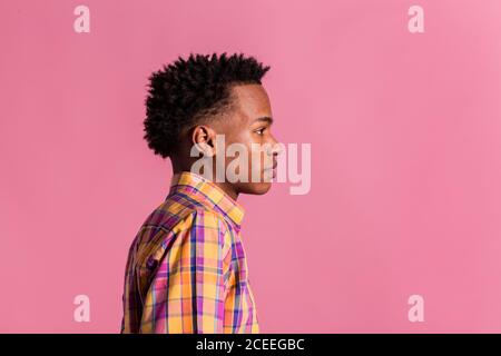 Hipster black man in colorful shirt Stock Photo
