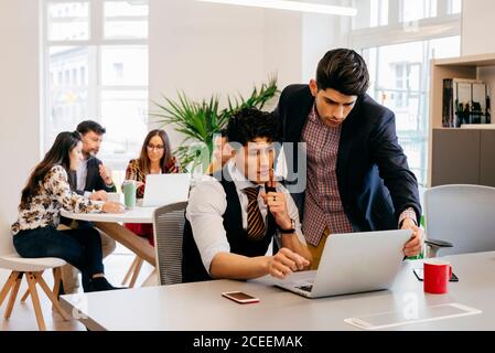 Multiethnic office team at work Stock Photo