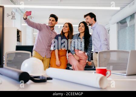 Office employees taking selfie Stock Photo