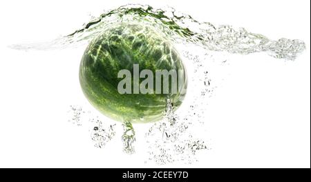 one green striped watermelon falling into water on a white background with splashes, drops and bubbles. summer fruit and berry. soft focus. Stock Photo