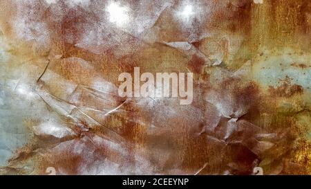 Seamless texture of old crumpled and rusty metal. A crumpled metal plate. Rusty grunge background of peeling paint. Close-up. For design, copy space. Stock Photo