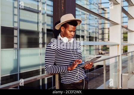 Relaxed man listening to music Stock Photo