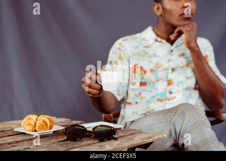 Black man having breakfast Stock Photo