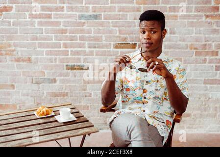 Black man having breakfast Stock Photo