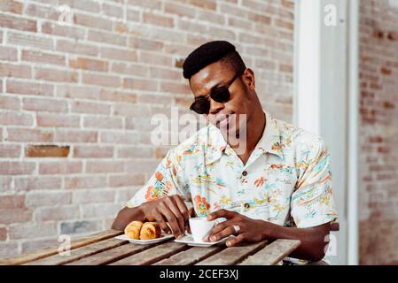 Black man having breakfast Stock Photo