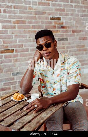 Black man having breakfast Stock Photo