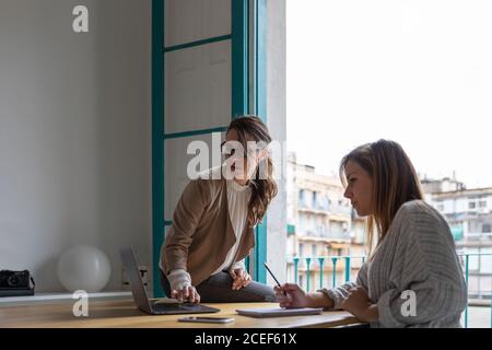 Young Women working at home Stock Photo