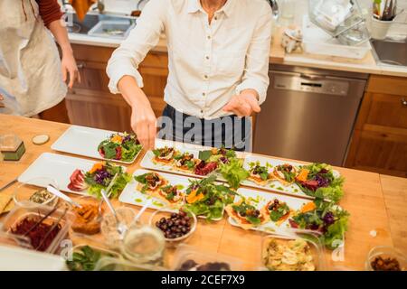 Two women cooking in cafe Stock Photo