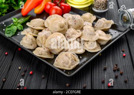 Traditional dumplings with meat, handmade, tasty food Stock Photo