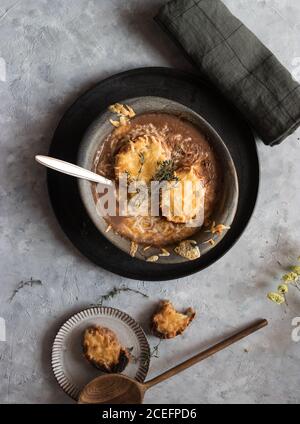 Bowl with French onion soup Stock Photo