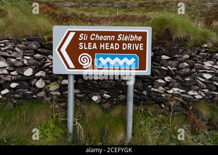 Directional Sign post  for scenic Slea Head Drive roadway on the Dingle Peninsula in County Kerry, Ireland Stock Photo