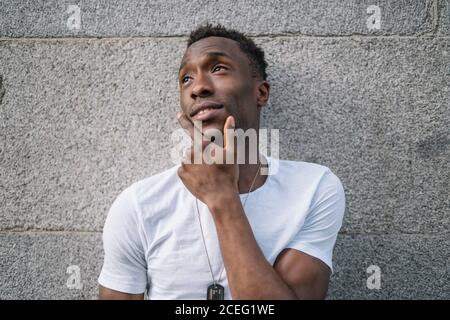 African man in white shirt posing. Stock Photo