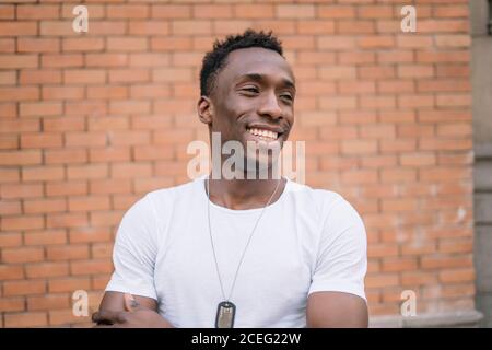 African man in white shirt posing. Stock Photo