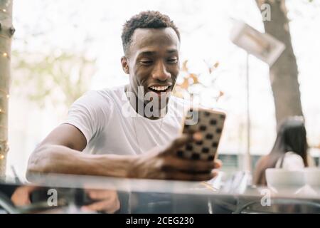 African man using mobile phone. Stock Photo