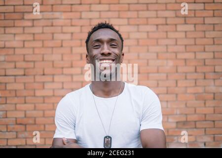 African man in white shirt posing. Stock Photo