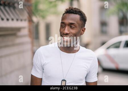 African man in white shirt posing. Stock Photo